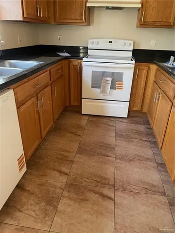 a utility room with washer and dryer