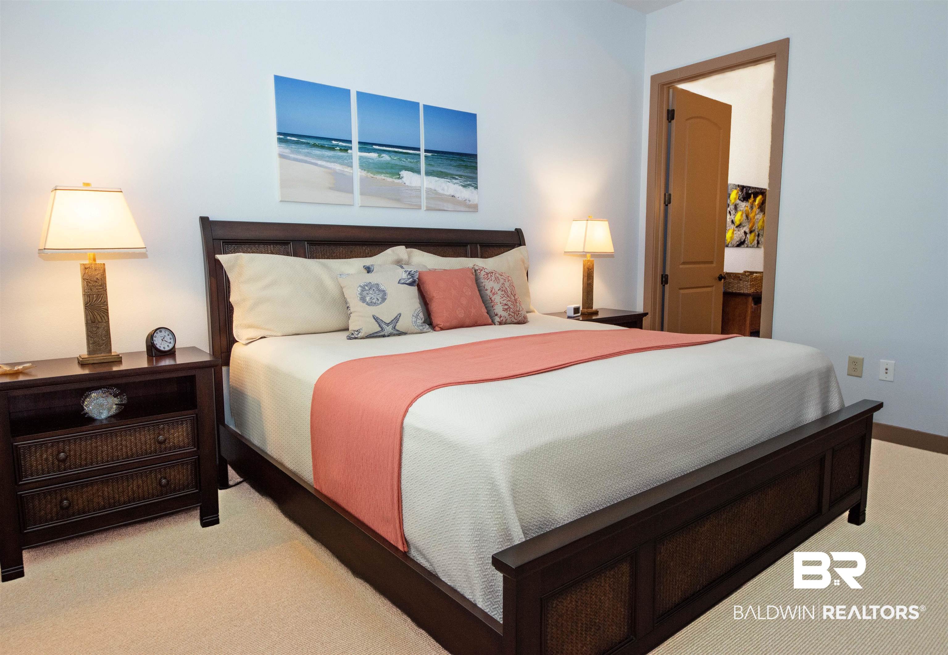 1430 Regency Road, Unit 301C Gulf Shores, AL 36542 - Photo 13 of 22 Master Bedroom with light carpet