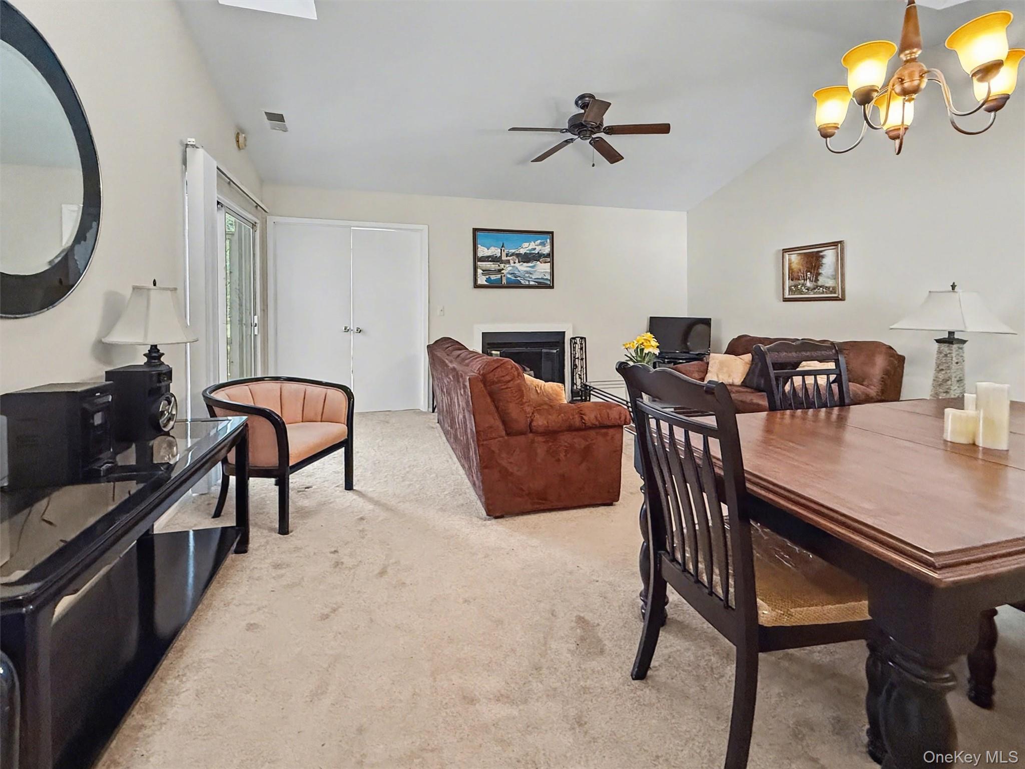 51 Hidden Ridge Drive Monticello, NY 12701 - Photo 11 of 31 Living room entrance to the primary bedroom suite, offering added privacy when closed.