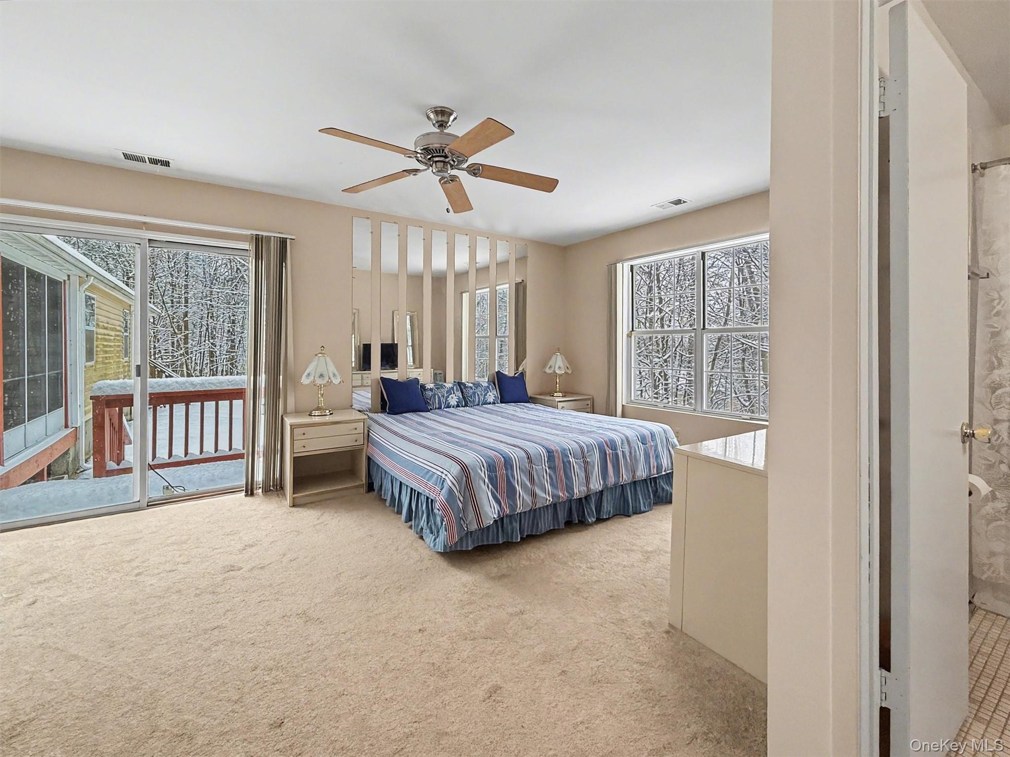 51 Hidden Ridge Drive Monticello, NY 12701 - Photo 14 of 31 Scenic backyard views and access to a private deck.