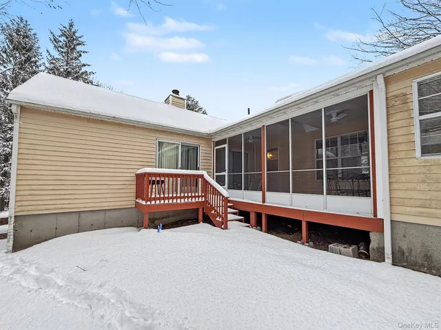 a view of a house with a large window