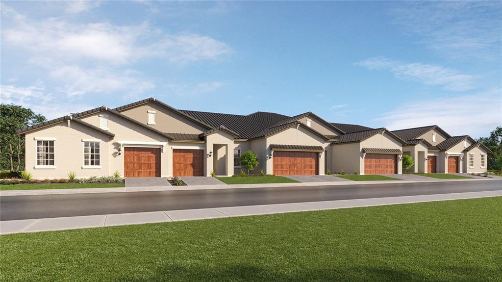 10718 Gable Dig Loop San Antonio, FL 33576 - Photo 1 of 1 front view of a house with a yard