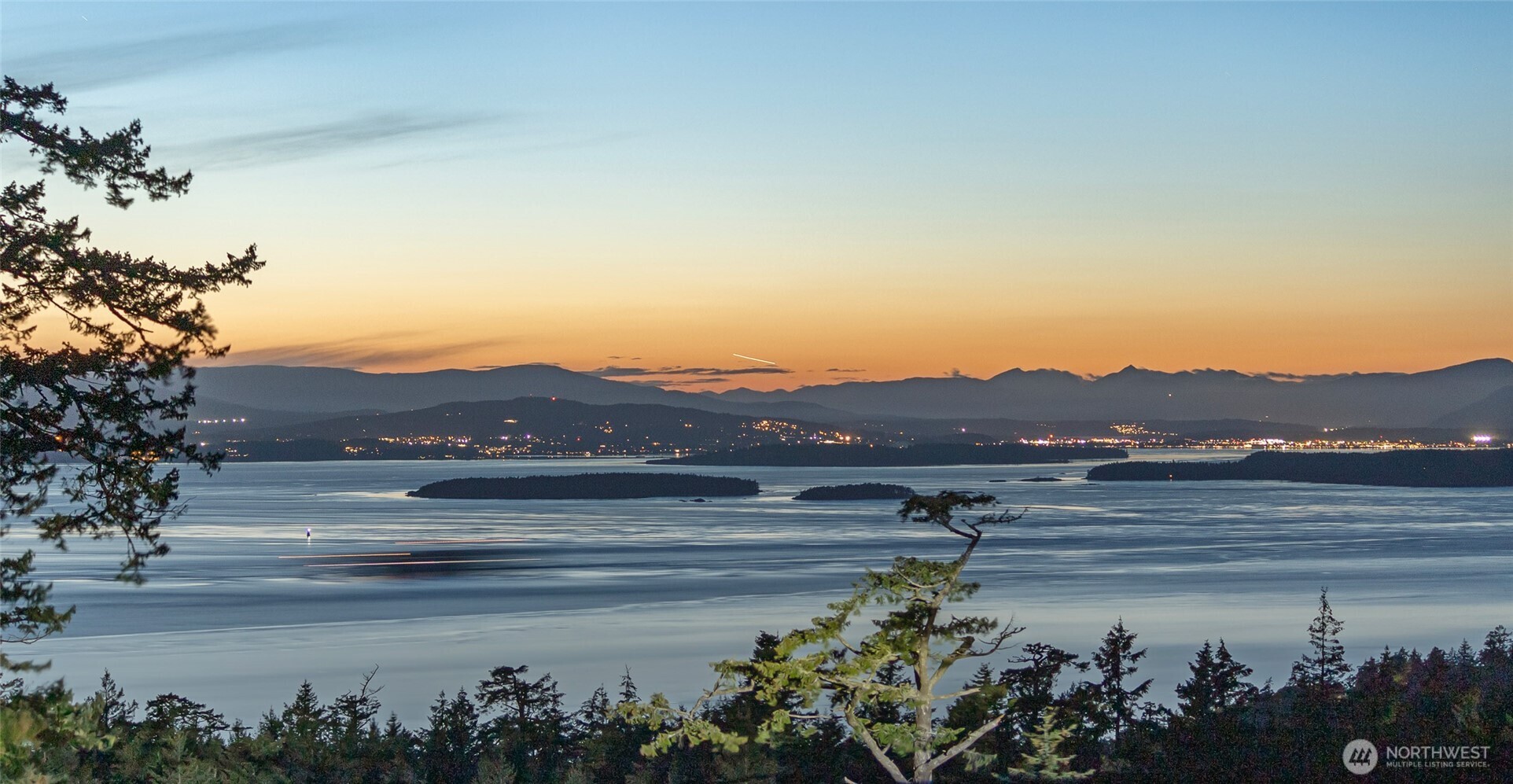 a view of a house with a lake view