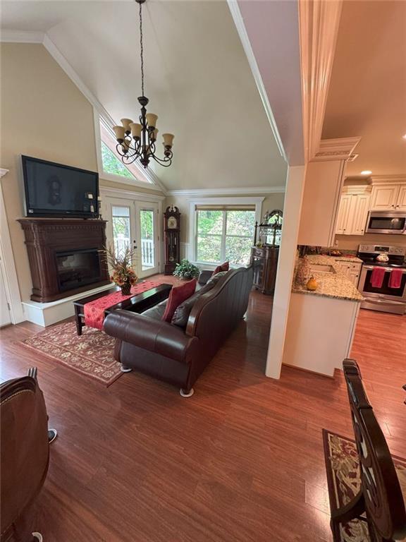 334 Eagle Circle Dillard, GA 30537 - Photo 15 of 29 a living room with furniture fireplace and flat screen tv