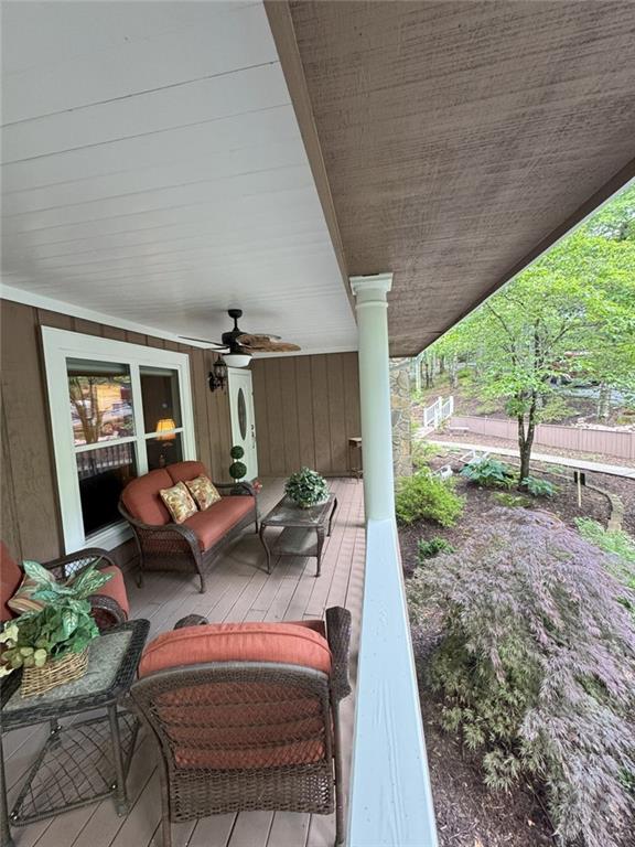 334 Eagle Circle Dillard, GA 30537 - Photo 18 of 29 a living room with furniture and a floor to ceiling window