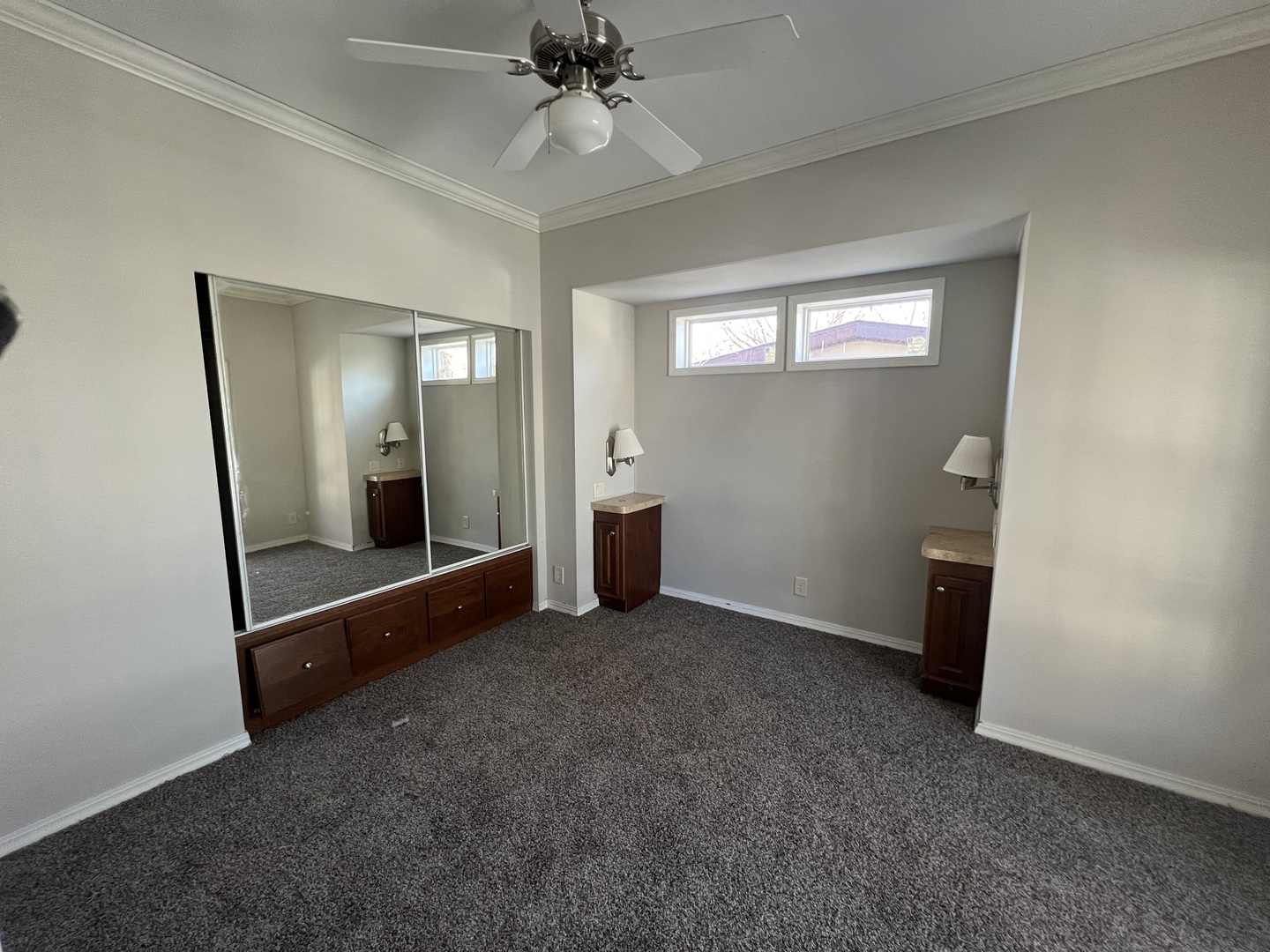 230 Northshore Road Elgin, IL 60123 - Photo 13 of 16 an empty room with closet and a chandelier fan