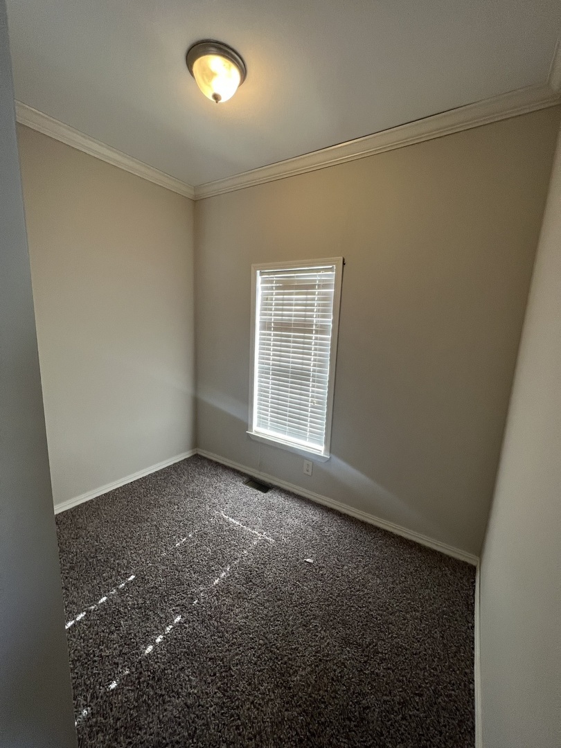 230 Northshore Road Elgin, IL 60123 - Photo 14 of 16 an empty room with a empty space and a window