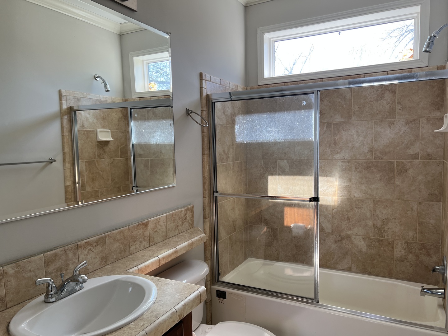 230 Northshore Road Elgin, IL 60123 - Photo 16 of 16 a bathroom with a sink and a mirror
