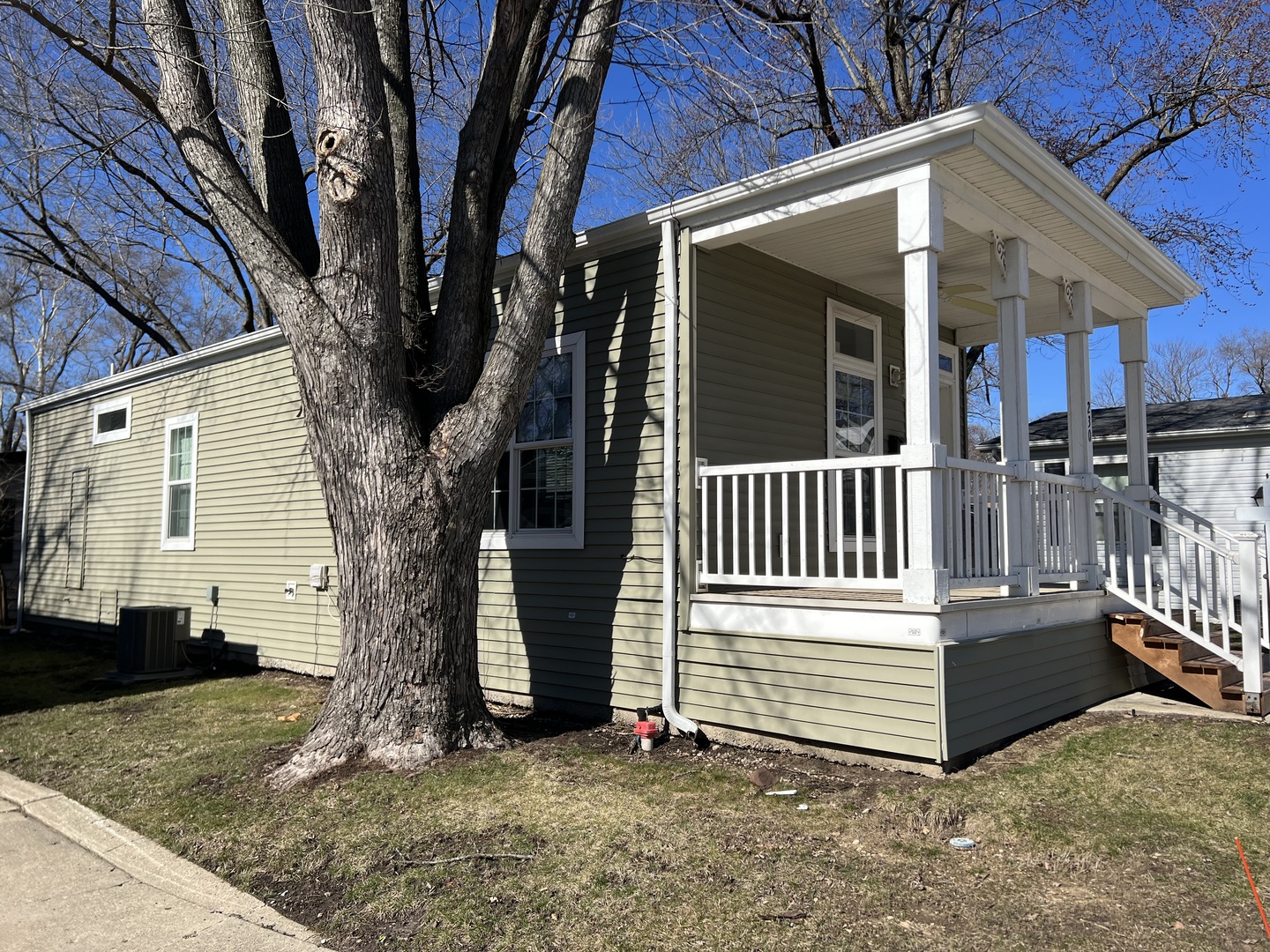 230 Northshore Road Elgin, IL 60123 - Photo 2 of 16 a view of a house with wooden fence