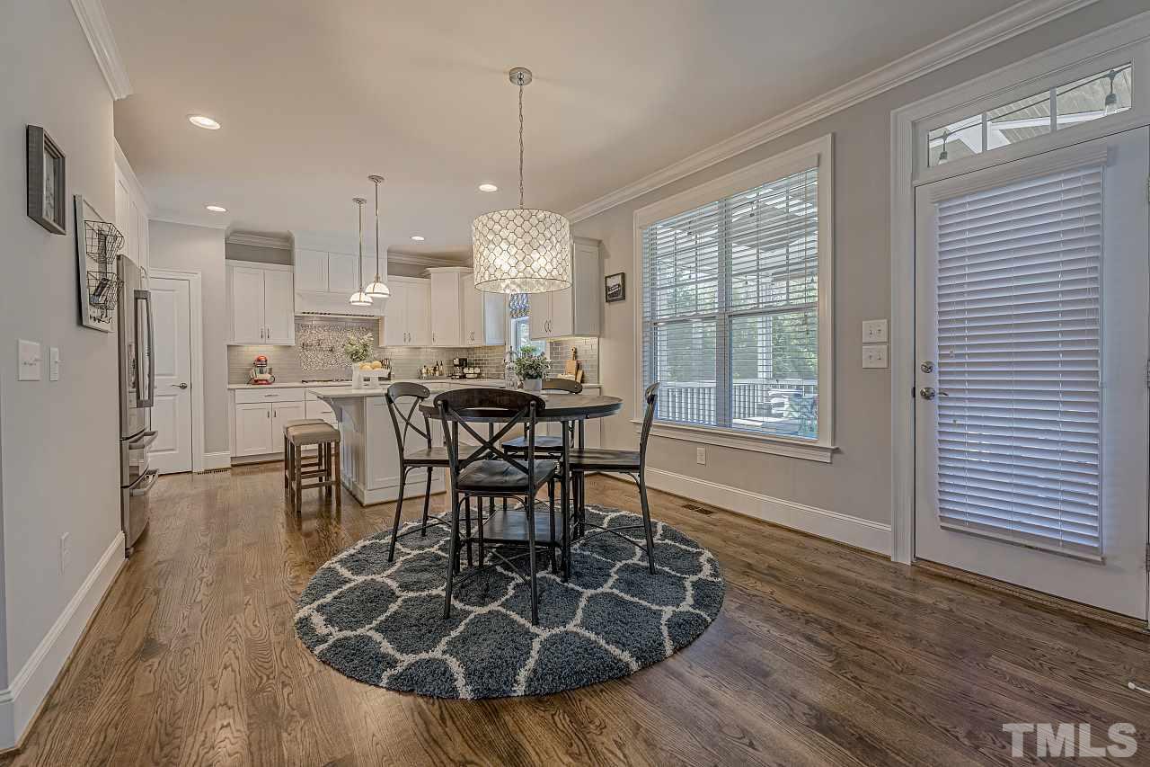 7605 Stonehenge Farm Lane Raleigh, NC 27613 - Photo 14 of 30 Kitchen nook overlooking luxurious kitchen