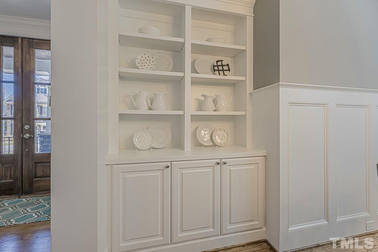 7605 Stonehenge Farm Lane Raleigh, NC 27613 - Photo 8 of 30 Beautiful built-ins situated in the dining room