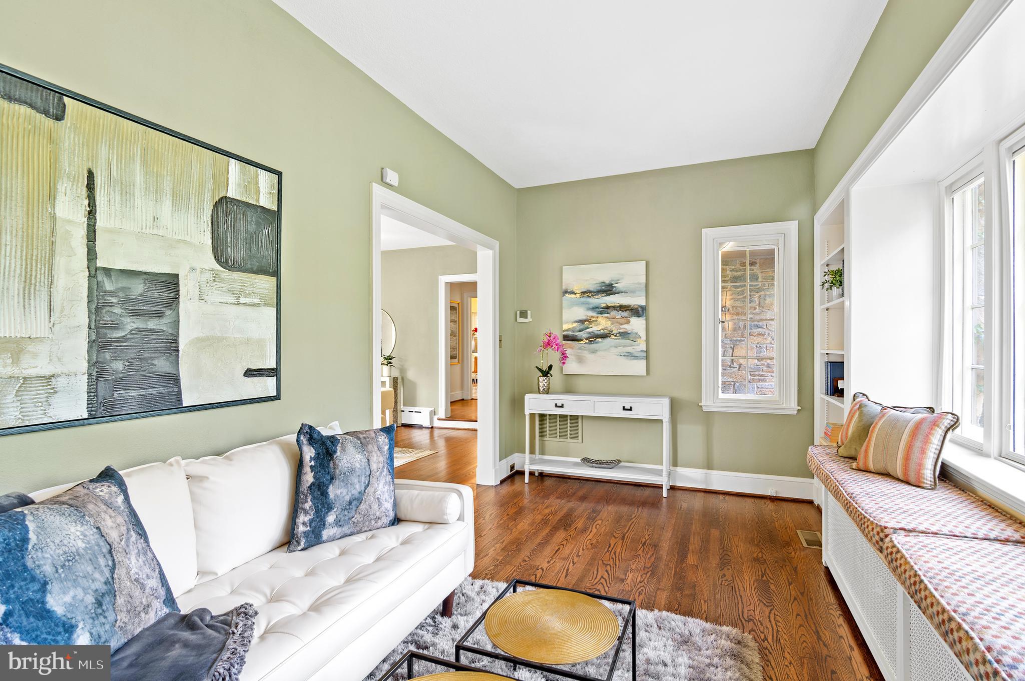 7704 Crossland Road Pikesville, MD 21208 - Photo 11 of 68 a living room with furniture and a wooden floor