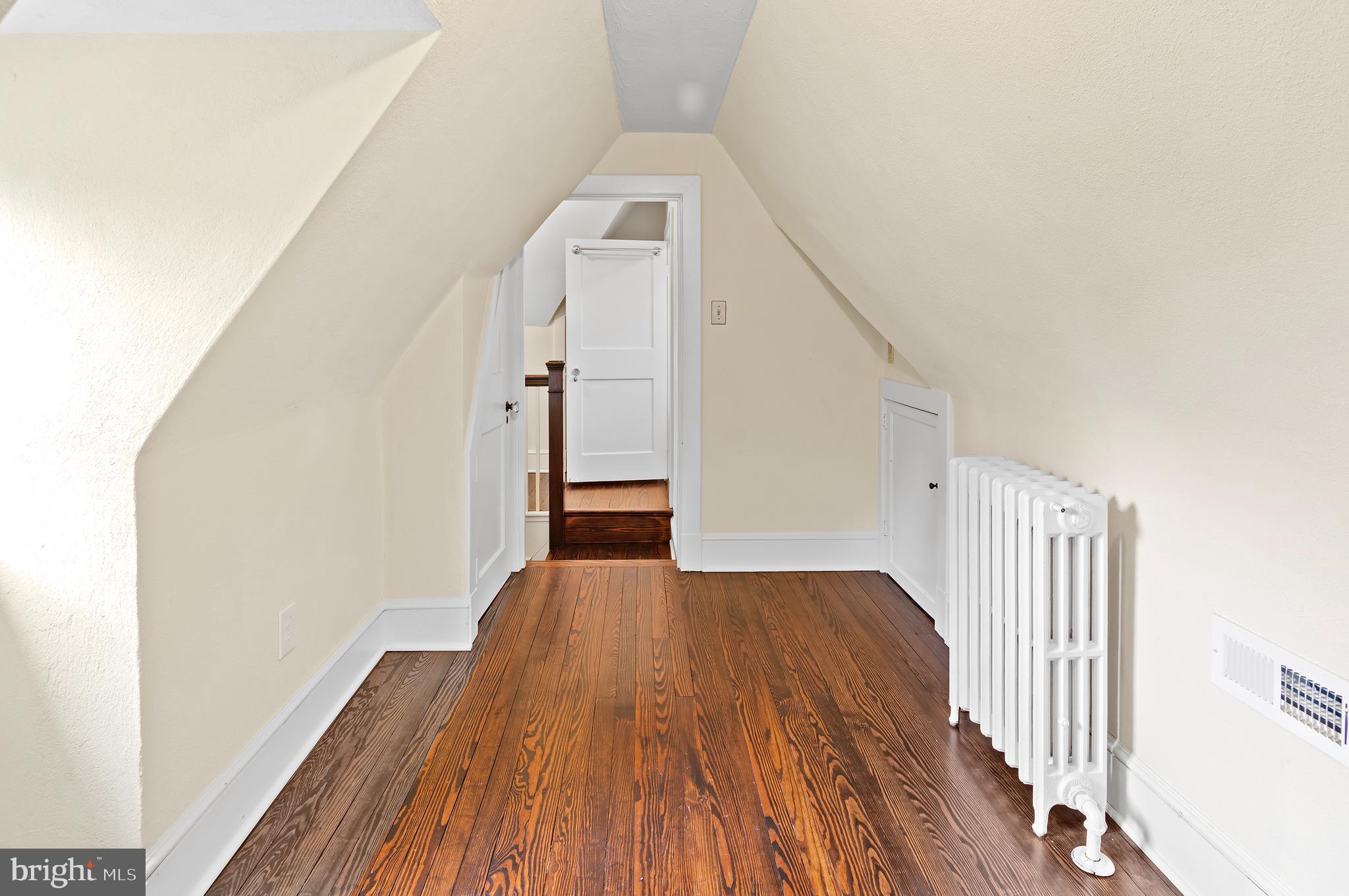 7704 Crossland Road Pikesville, MD 21208 - Photo 43 of 68 a view of a hallway view with staircase