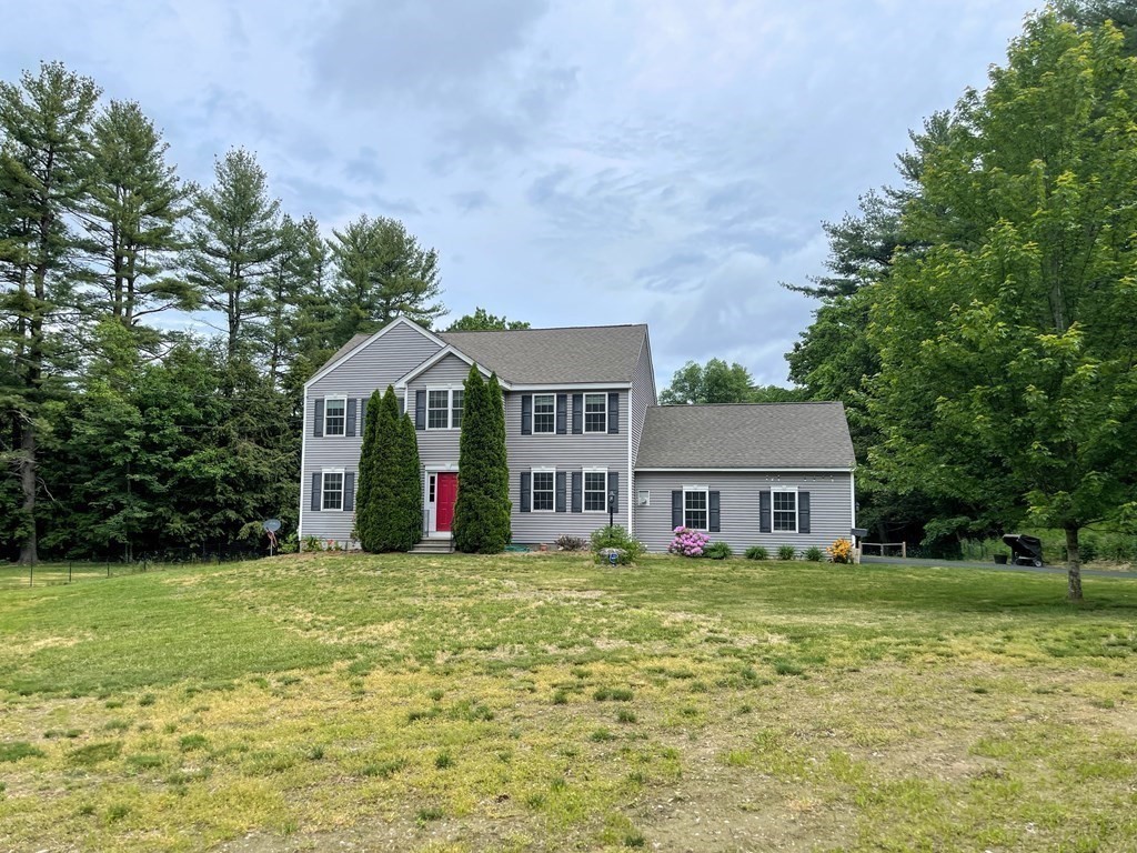 149 Groton Road Shirley, MA 01464 - Photo 29 of 32 a view of a house with a big yard and large trees