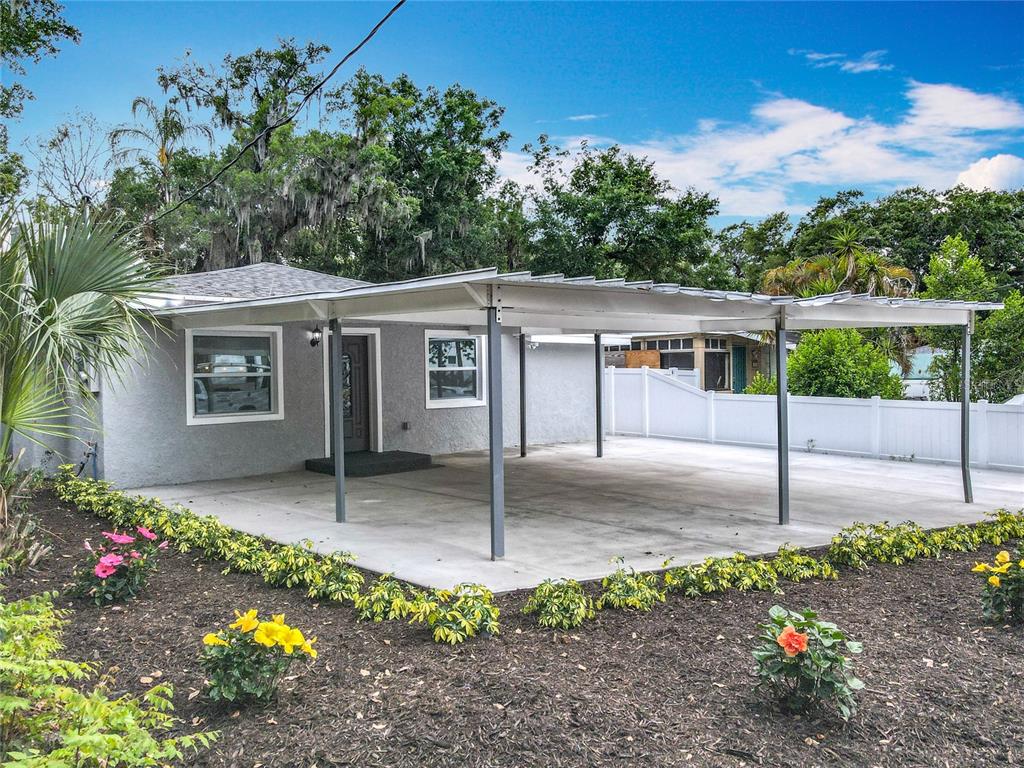 1414 Beaver Street Orlando, FL 32806 - Photo 2 of 43 a front view of a house with a porch