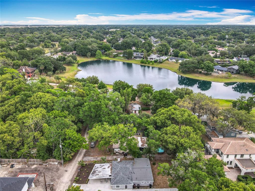 1414 Beaver Street Orlando, FL 32806 - Photo 38 of 43 an aerial view of residential houses with outdoor space and lake view