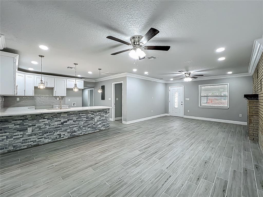 1414 Beaver Street Orlando, FL 32806 - Photo 8 of 43 a view of kitchen and windows