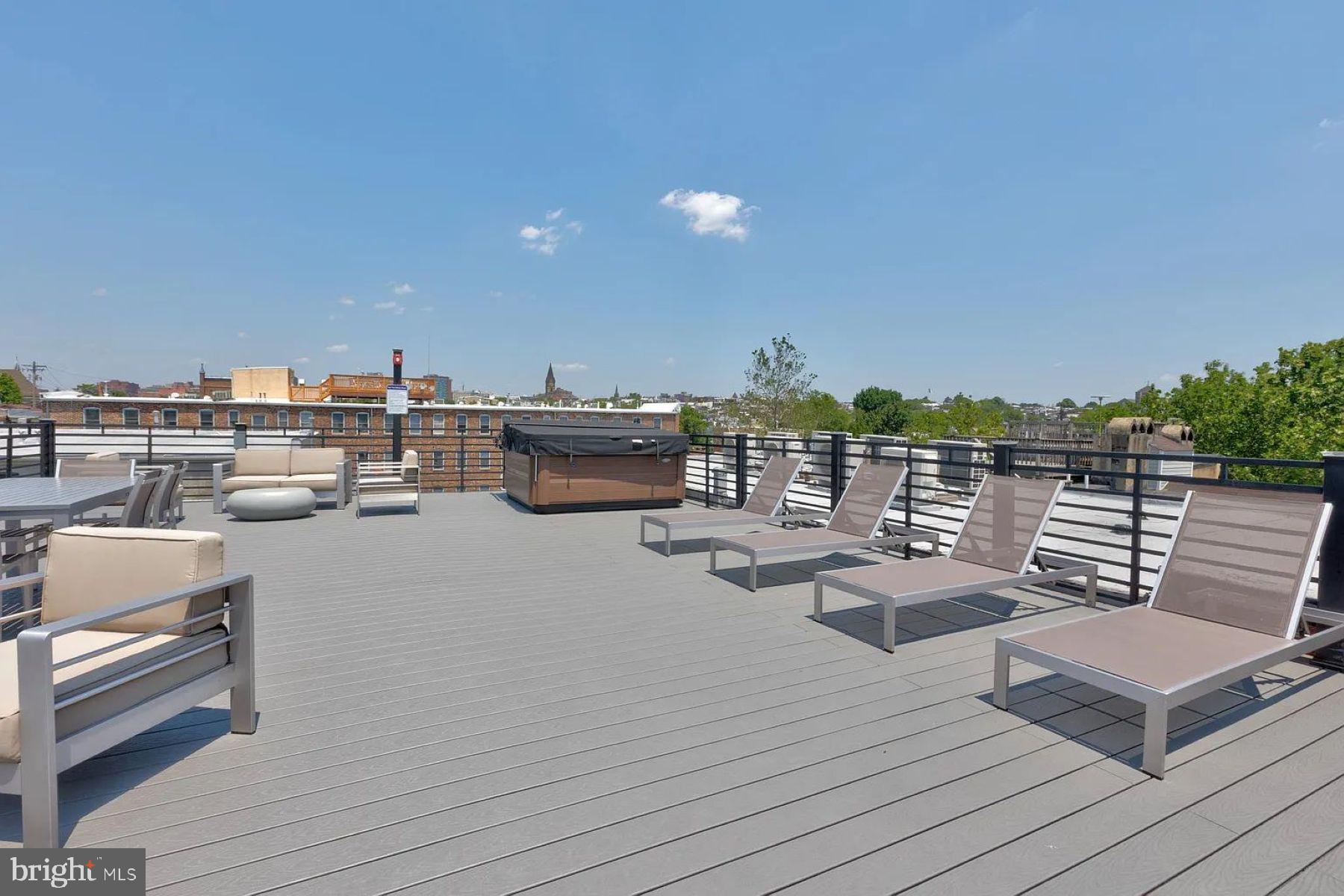 1742 Fleet Street, Unit 301 Baltimore, MD 21231 - Photo 13 of 20 a view of roof deck with seating space