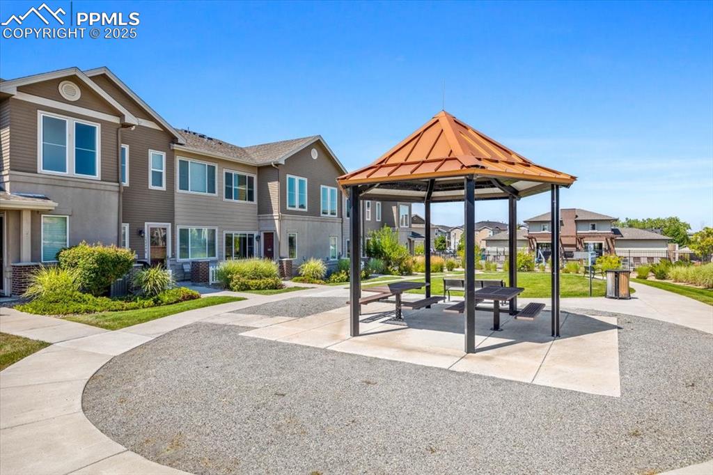 15446 West 64th Loop, Unit D Arvada, CO 80007 - Photo 18 of 22 a view of a house with outdoor space