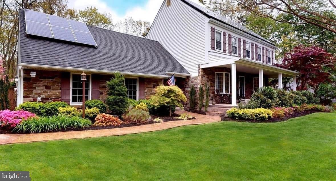 10 Cutts Drive Tabernacle, NJ 08088 - Photo 44 of 62 a front view of a house with a garden and plants