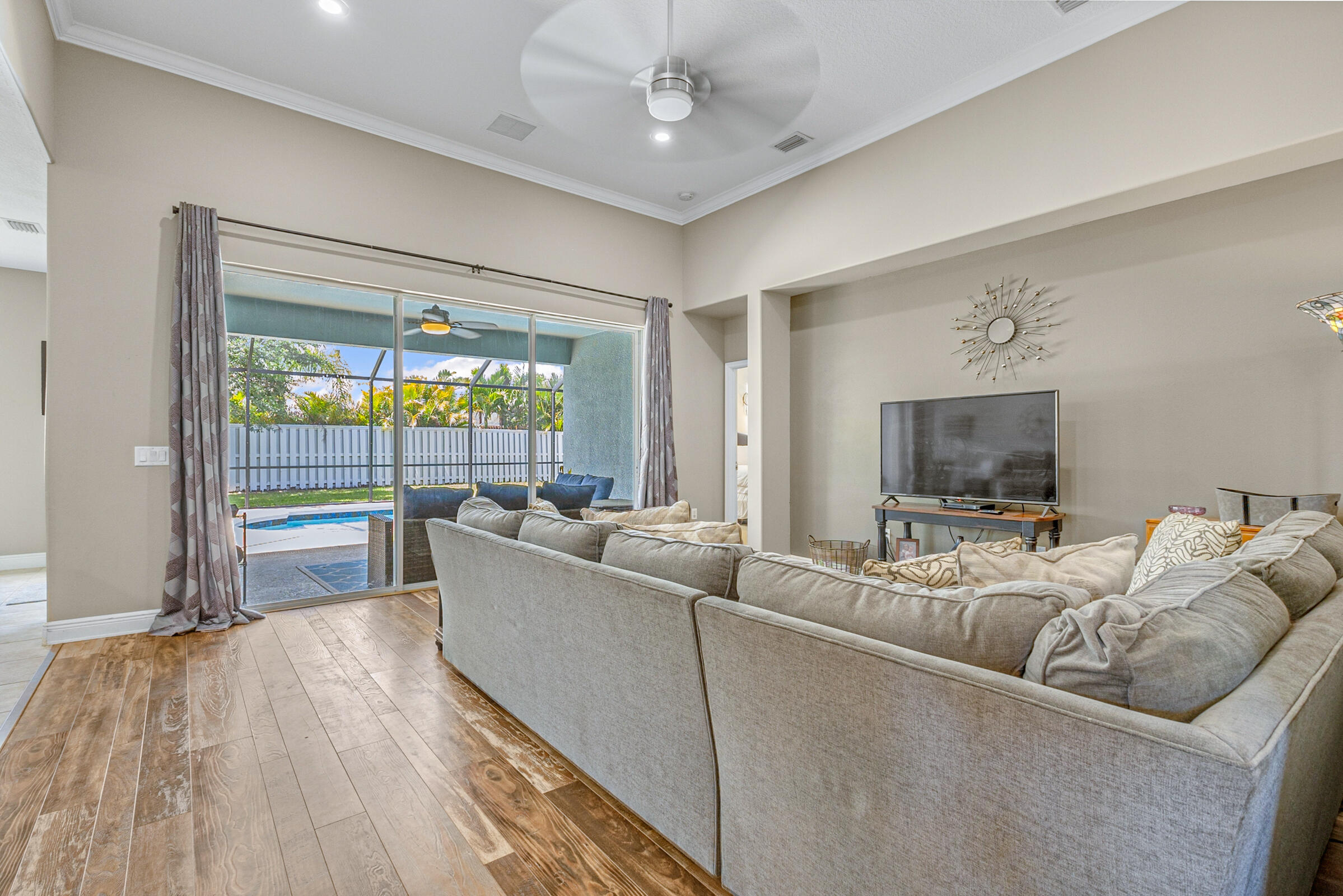 6002 Goleta Circle Melbourne, FL 32940 - Photo 14 of 45 a living room with furniture and a flat screen tv