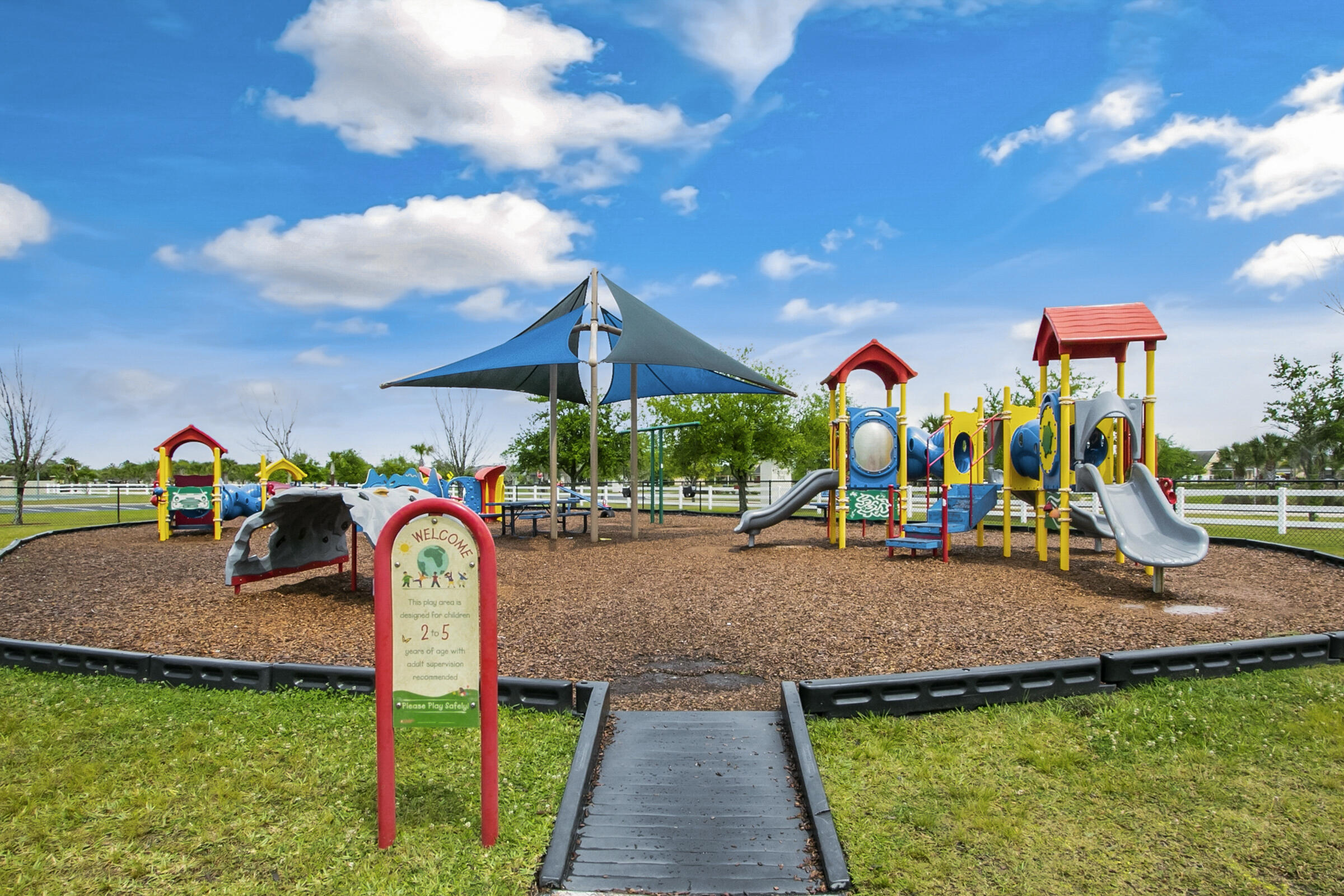 6002 Goleta Circle Melbourne, FL 32940 - Photo 33 of 45 a front view of a house with garden