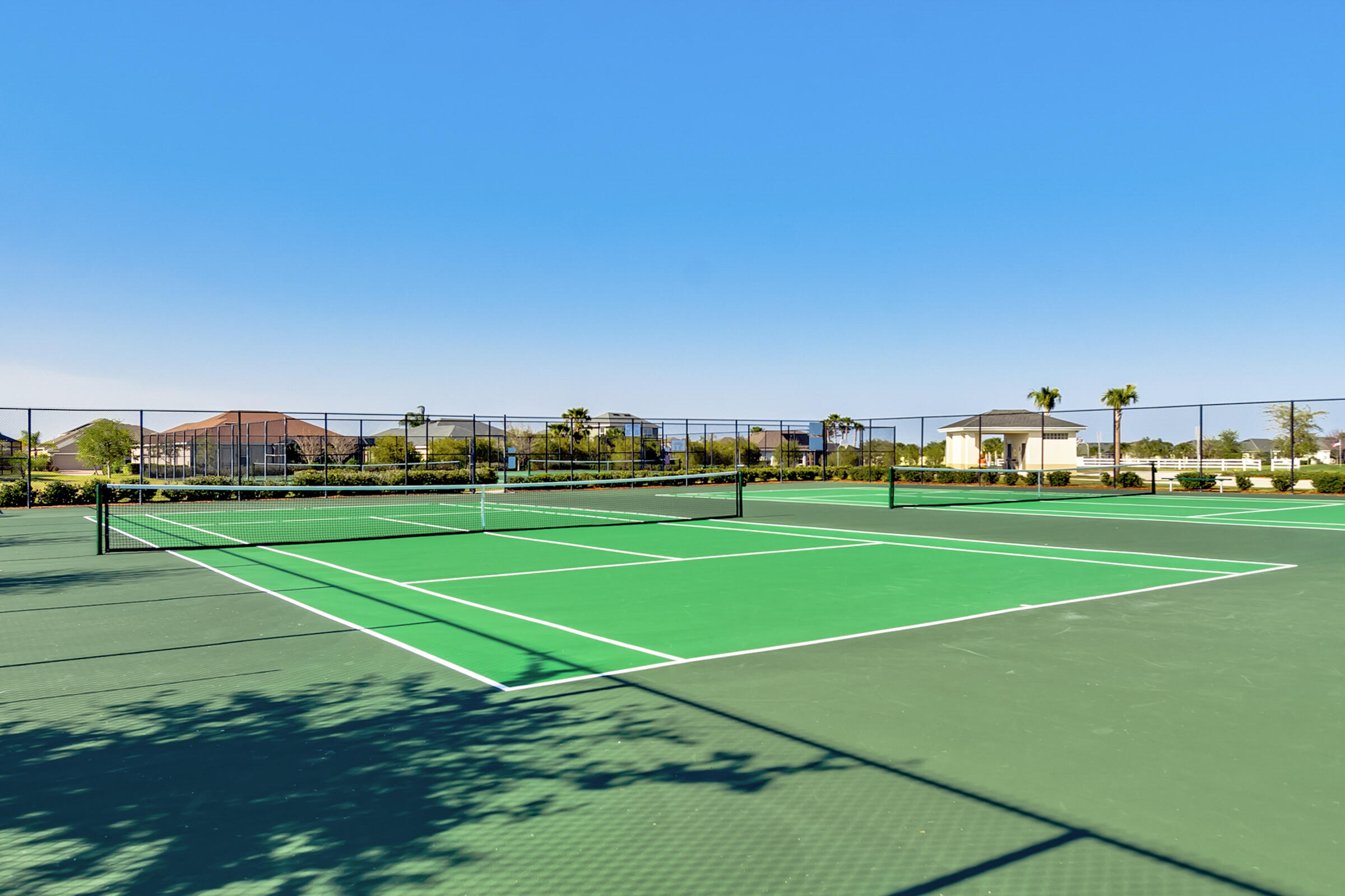 6002 Goleta Circle Melbourne, FL 32940 - Photo 38 of 45 a view of an outdoor space and tennis court