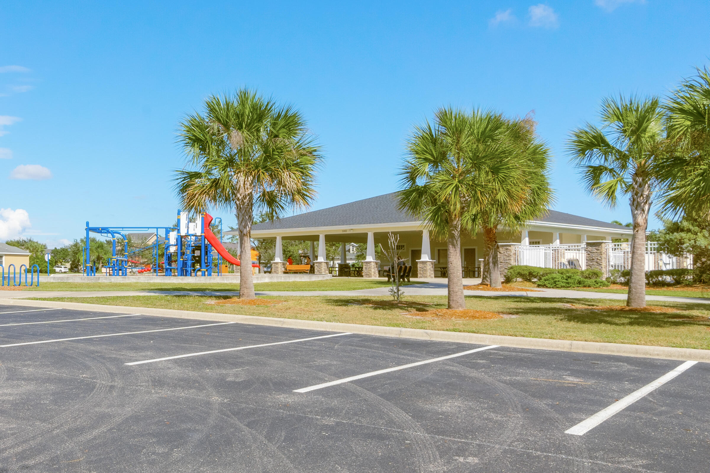 6002 Goleta Circle Melbourne, FL 32940 - Photo 40 of 45 a view of a swimming pool and a yard