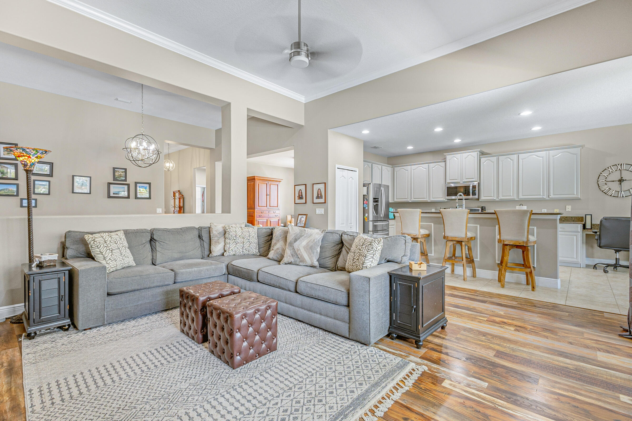 6002 Goleta Circle Melbourne, FL 32940 - Photo 8 of 45 a living room with furniture and kitchen view
