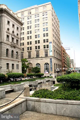 a front view of a building with street view