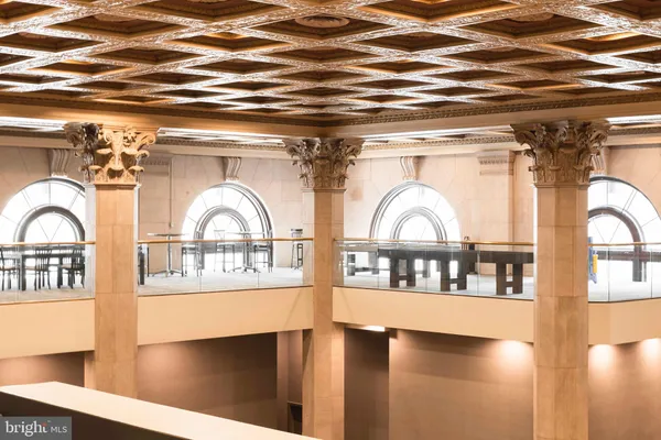 a kitchen with a stove a refrigerator and a sink