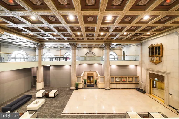 a view of a backyard with sitting area