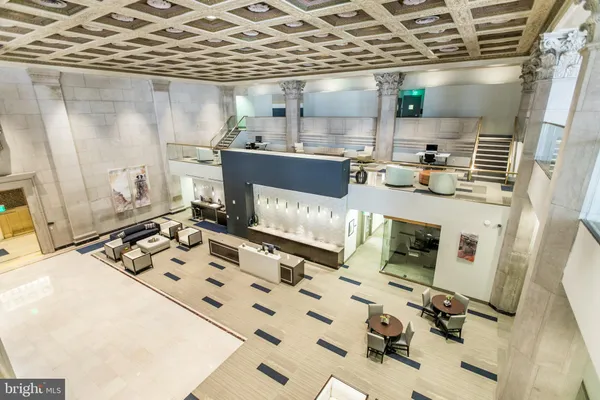 a room with gym equipment and a large window