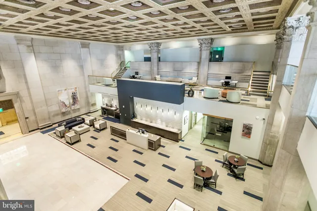 a room with gym equipment and a large window