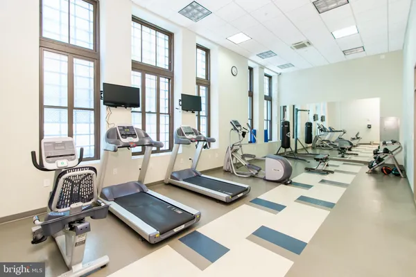 a picture of a living room with a fireplace