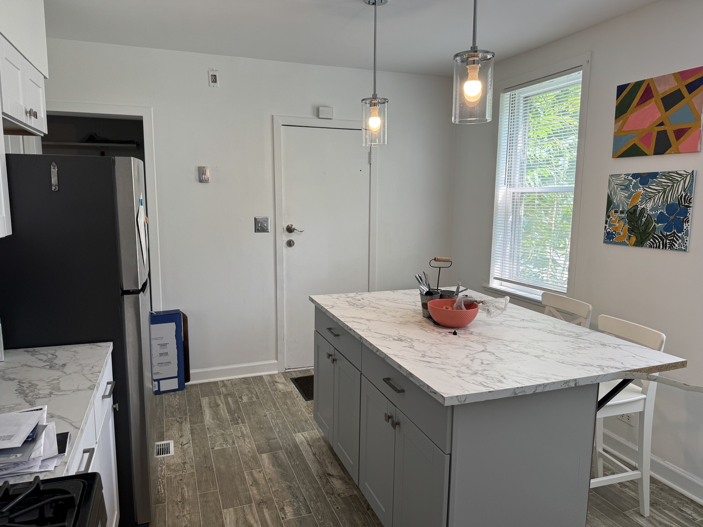 116 East Quincy Street, Unit 1 Riverside, IL 60546 - Photo 4 of 10 a kitchen with a sink refrigerator and window