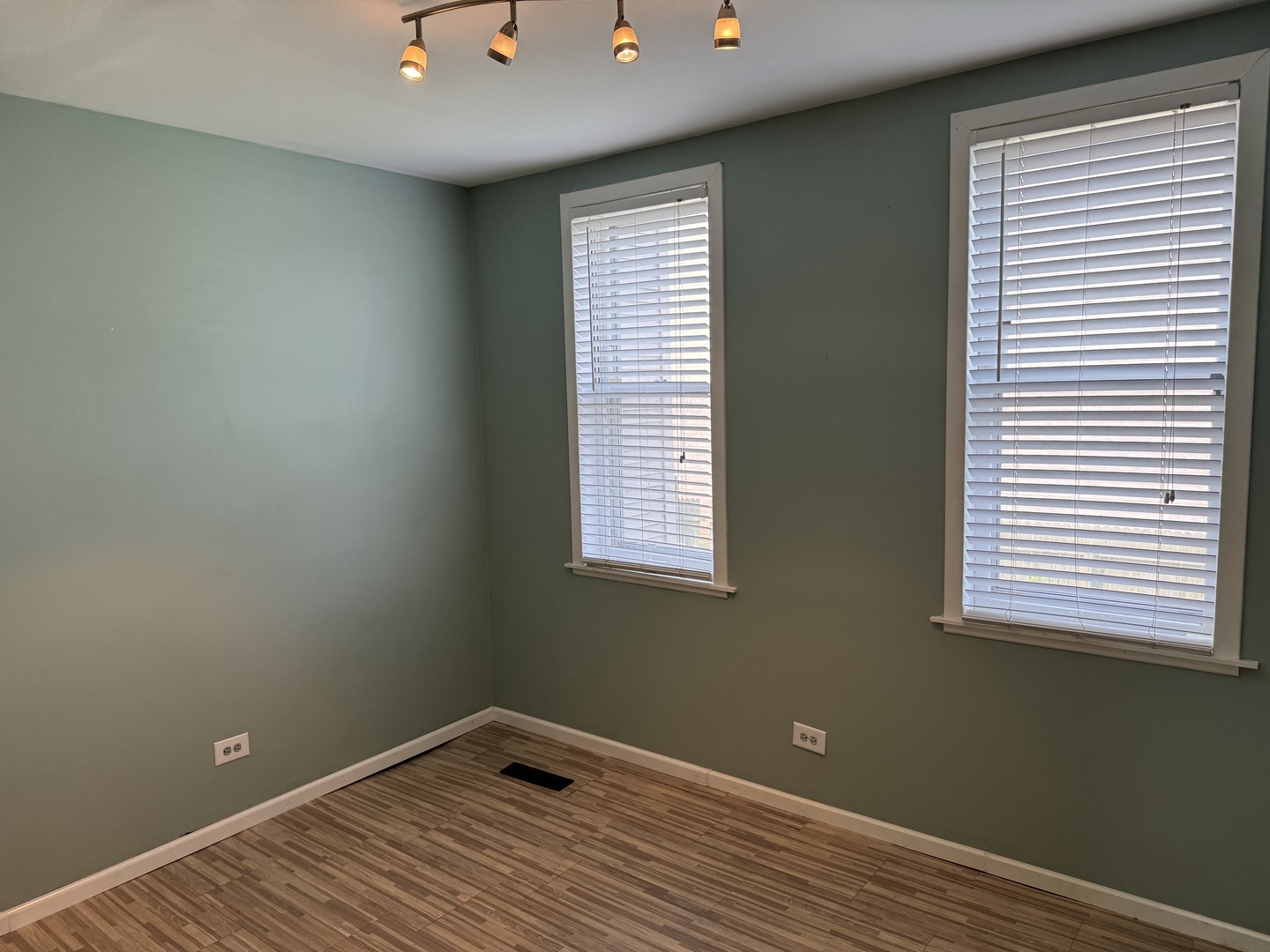 116 East Quincy Street, Unit 1 Riverside, IL 60546 - Photo 7 of 10 a view of a room with window and ceiling fan