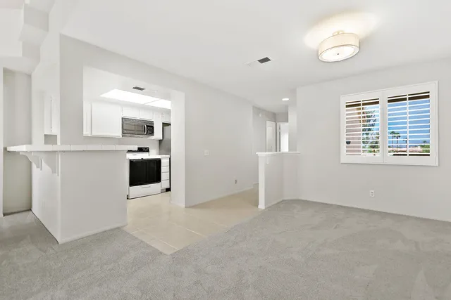 a view of a kitchen with a sink