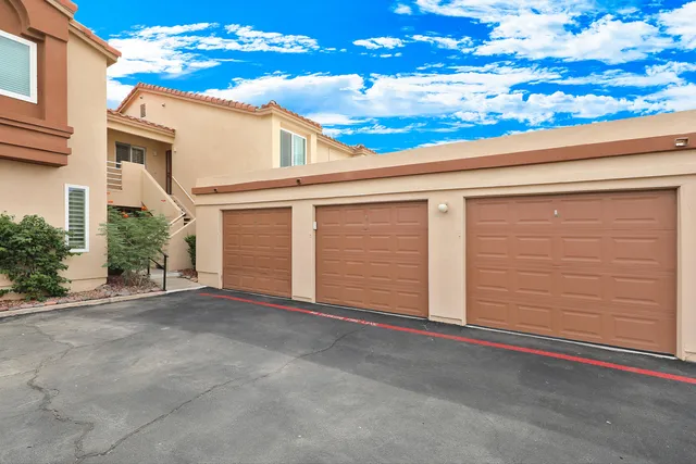 a view of a house with a garage