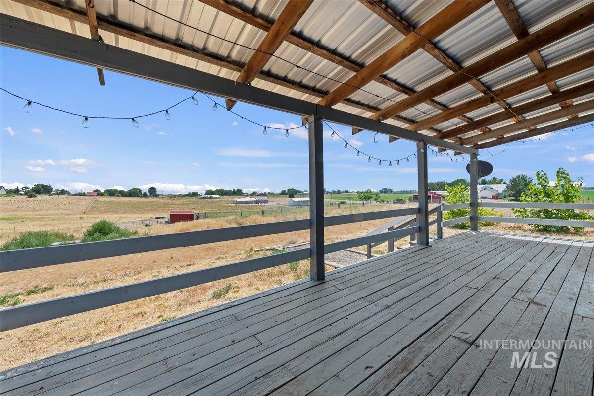 14490-14492 Sand Hollow Road Caldwell, ID 83607 - Photo 13 of 50 Covered deck with view of countryside