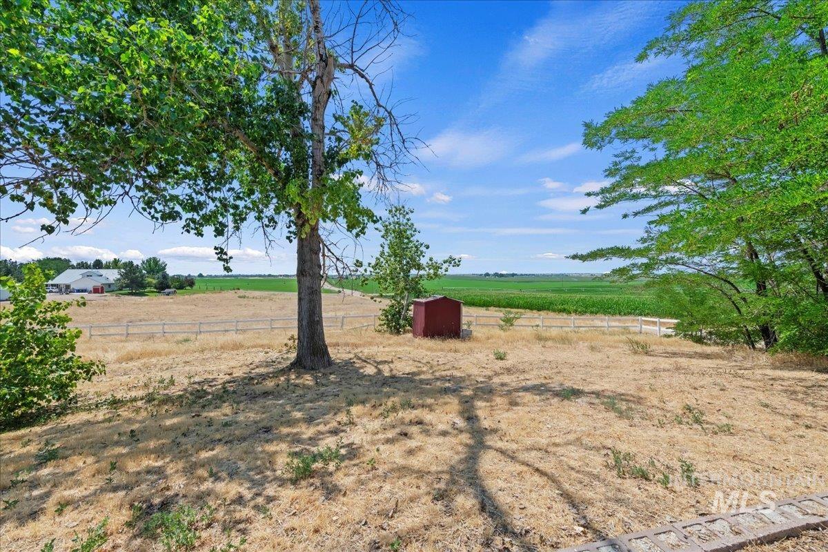 14490-14492 Sand Hollow Road Caldwell, ID 83607 - Photo 31 of 50 View of front yard featuring a view of countryside.