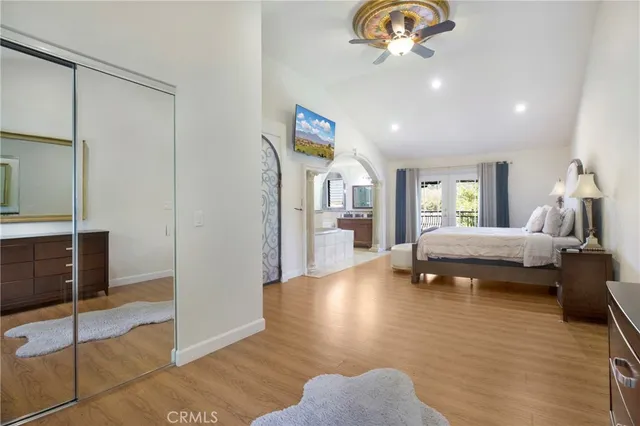 a bedroom with furniture and window