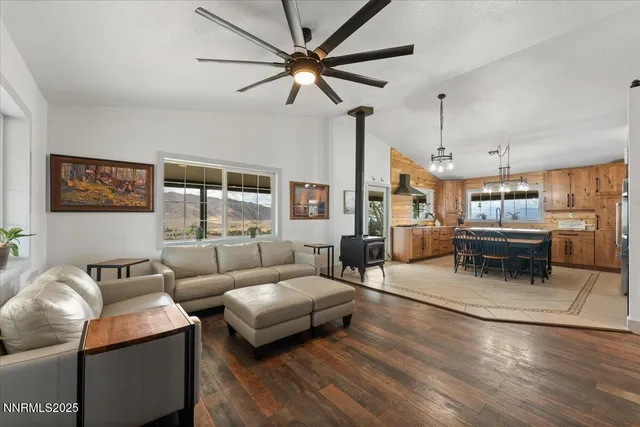 a view of walk in closet with clothes
