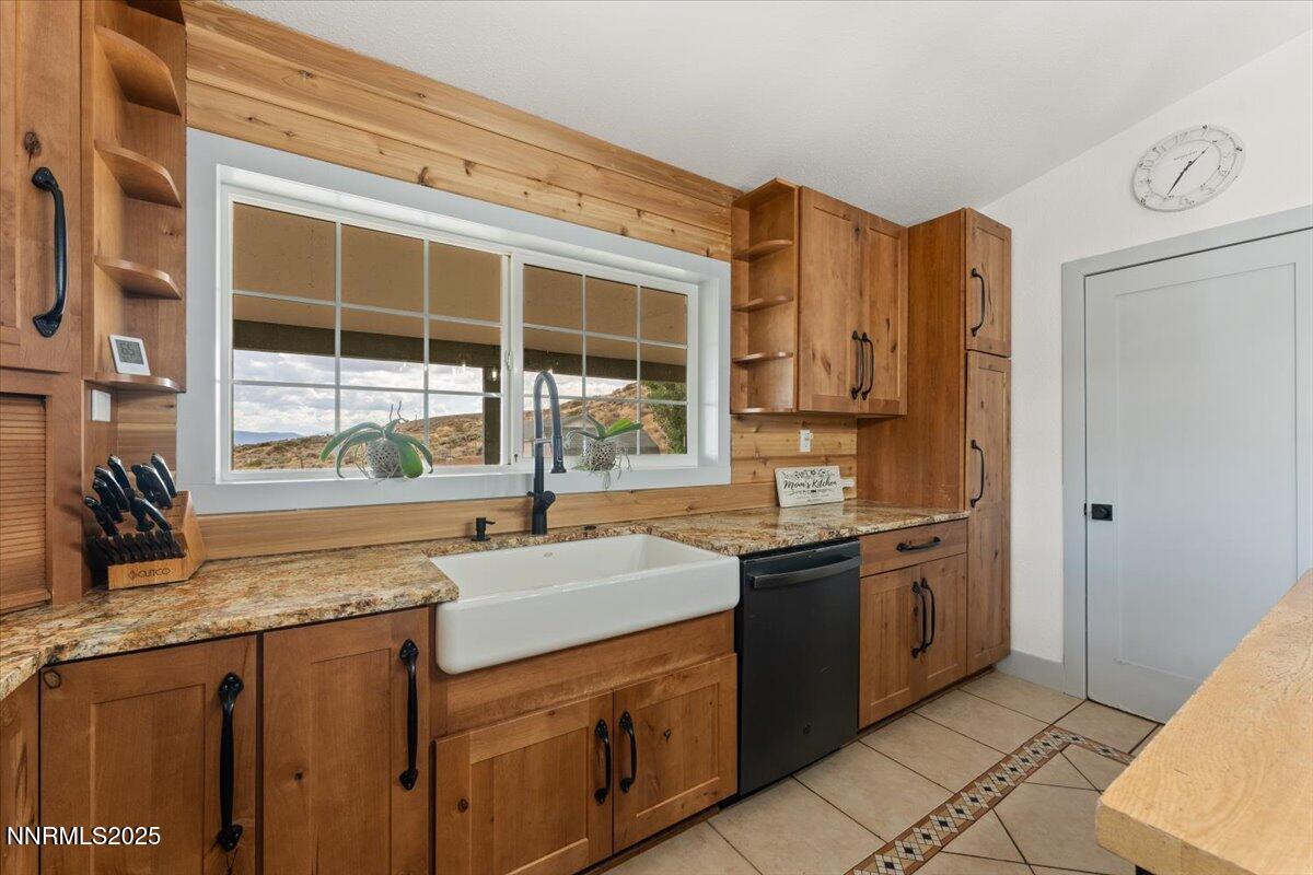 15030 North Red Rock Road Reno, NV 89508 - Photo 20 of 89 a kitchen with stainless steel appliances granite countertop a sink and a stove