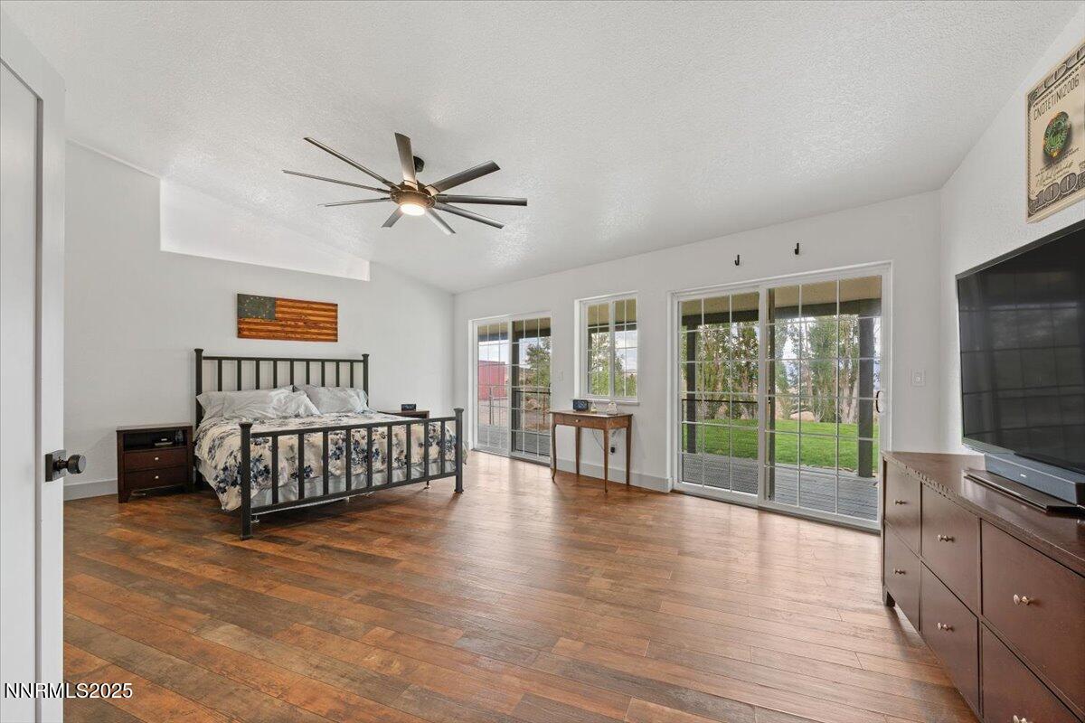 15030 North Red Rock Road Reno, NV 89508 - Photo 23 of 89 a living room with hardwood floor and a flat screen tv