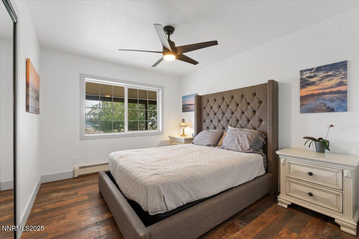 15030 North Red Rock Road Reno, NV 89508 - Photo 30 of 89 a bedroom with a bed and a window