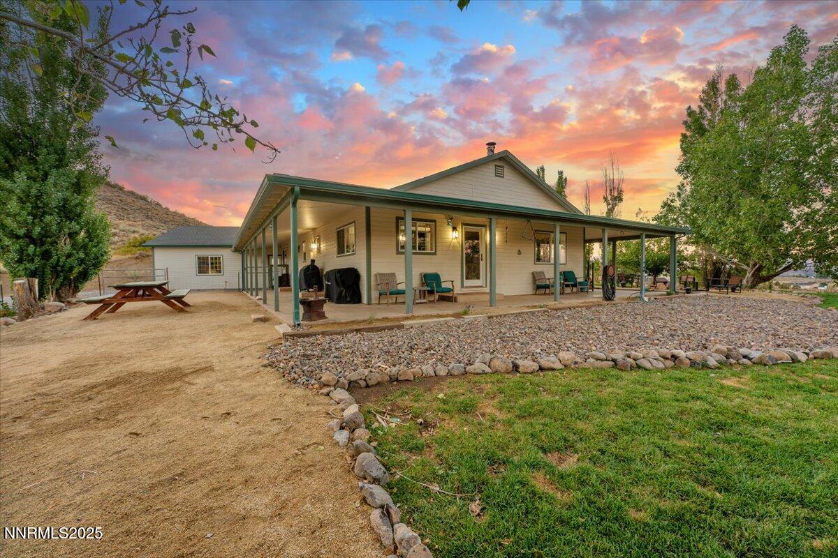 15030 North Red Rock Road Reno, NV 89508 - Photo 81 of 89 a front view of a house with a yard