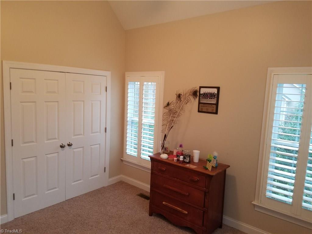 145 Goff Road King, NC 27021 - Photo 15 of 27 Spacious bedroom with plantation shutters on windows