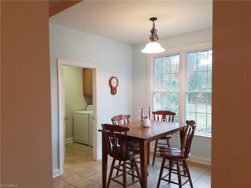 145 Goff Road King, NC 27021 - Photo 9 of 27 Breakfast nook ( laundry room at left side)