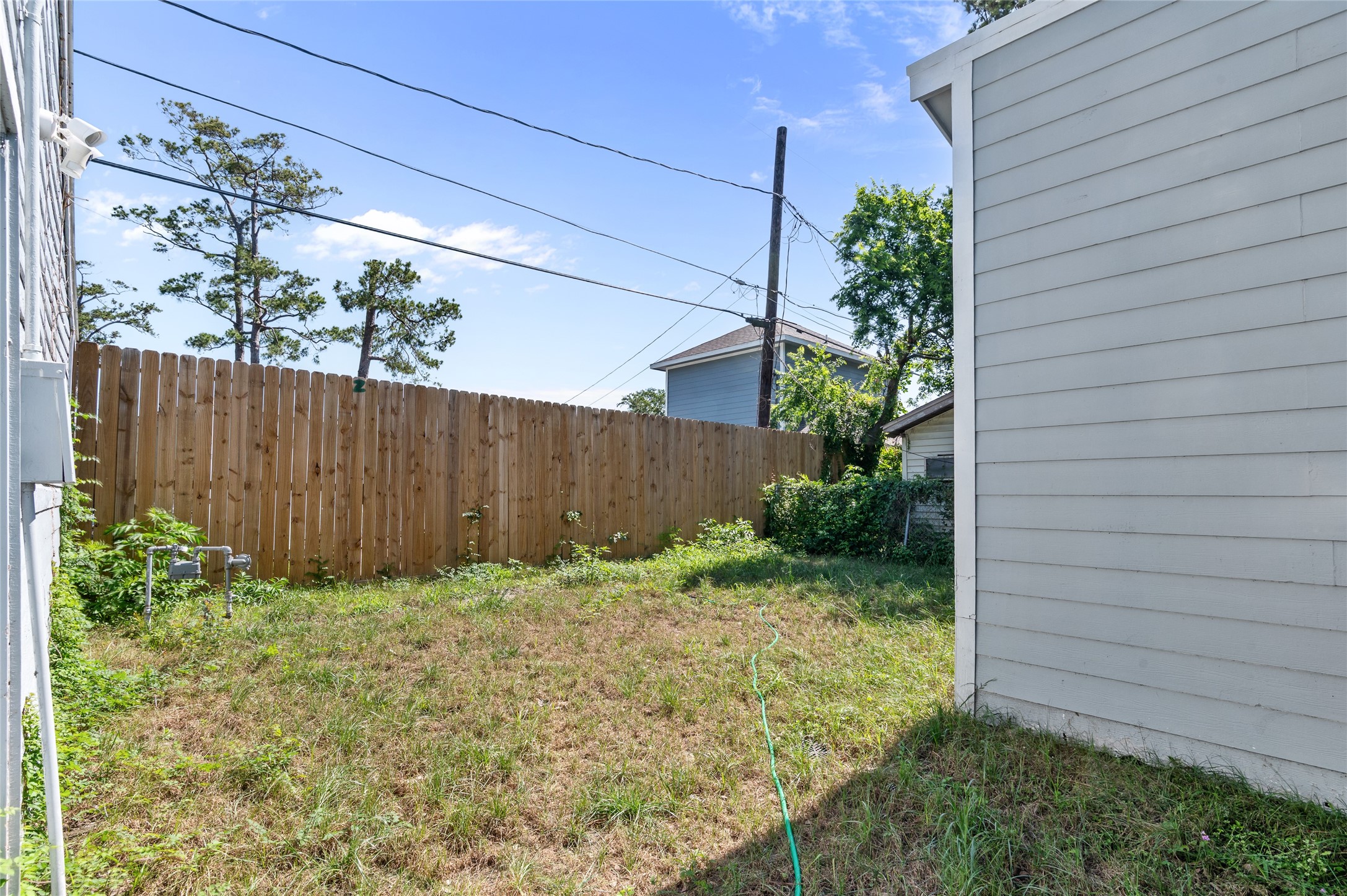 3853 Rosedale Street Houston, TX 77004 - Photo 43 of 50 Private backyard with newly added privacy fence.
